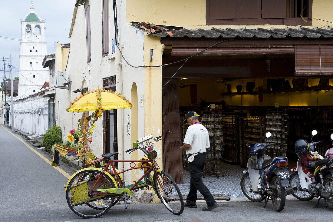 Rickshaw driver in Chinatown, Melaka, Malaysia