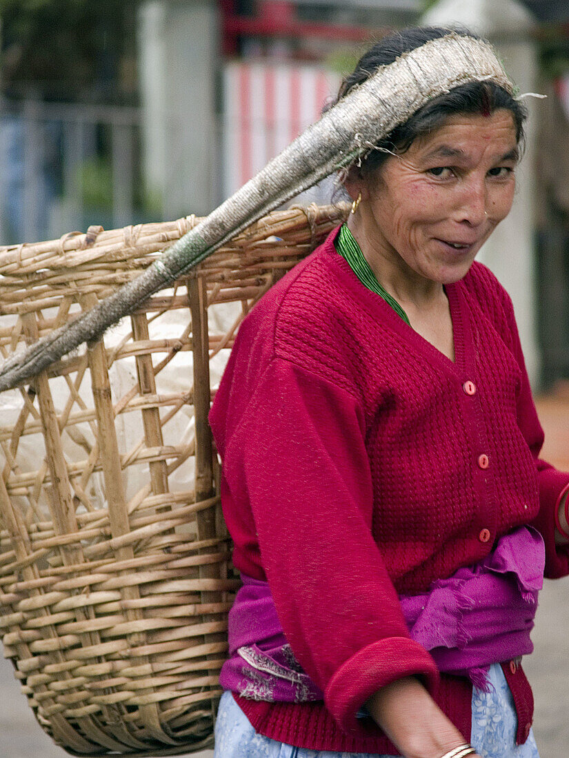 Nepali woman and her basket in Darjeeling
