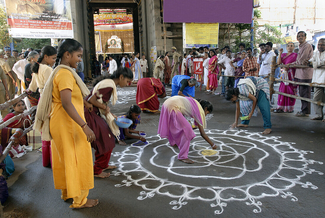 Kolam drawn on the floor in the front of the temple, India.