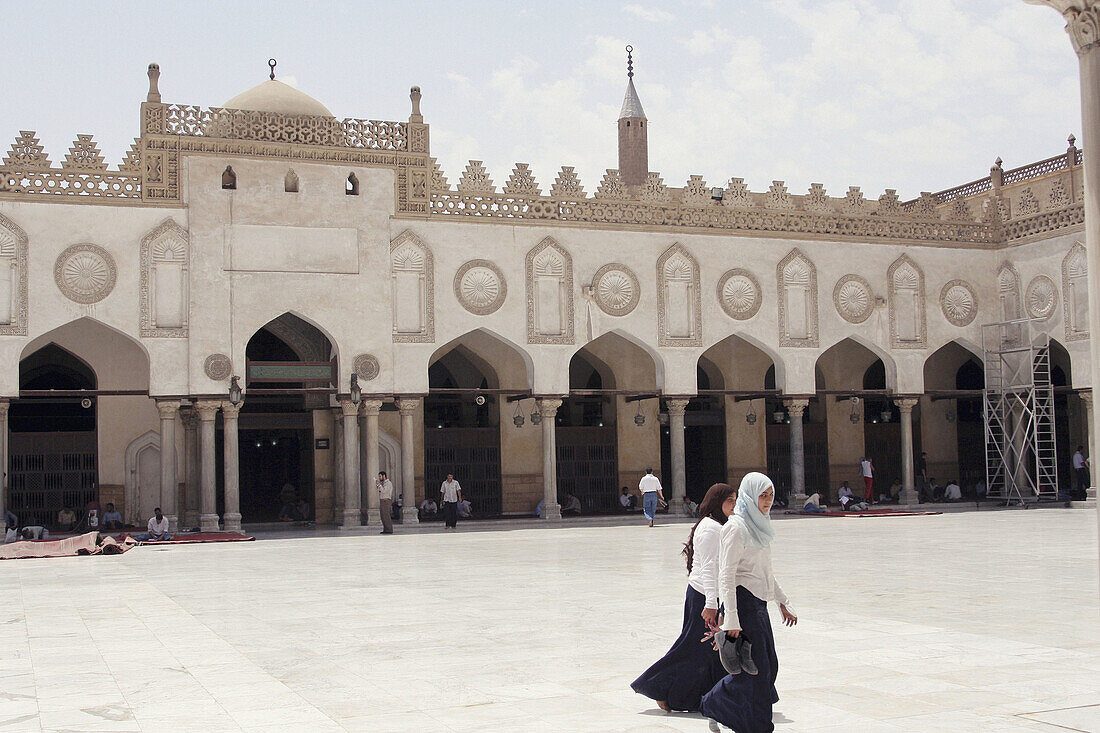 Two school  Girls walking inside Al-azhar Mosque in Cairo, Egypt