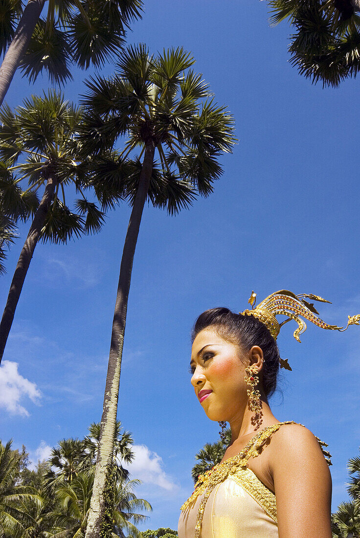 Thailand, Phuket, Girl in traditional Thai clothes