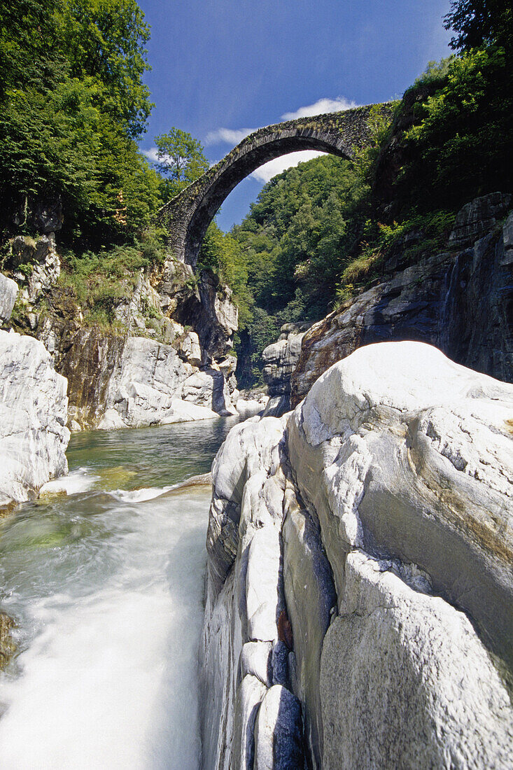 Stone bridge at Centovalli under blue sky, Ticino, Switzerland, Europe