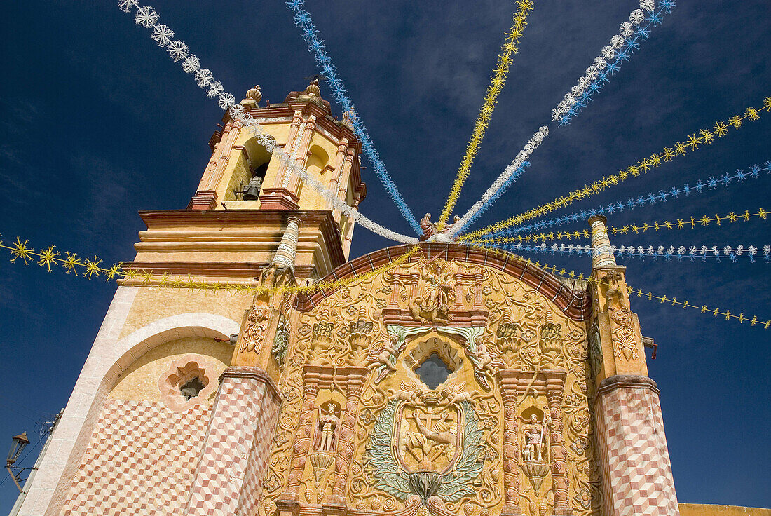 Architectural detail, Architectural details, Architecture, Blue, Blue sky, Building, Buildings, Church, Churches, Color, Colour, Conca Mission, Daytime, Exterior, Franciscan mission, Franciscan missions, From below, Garland, Garlands, Low angle, Low angle