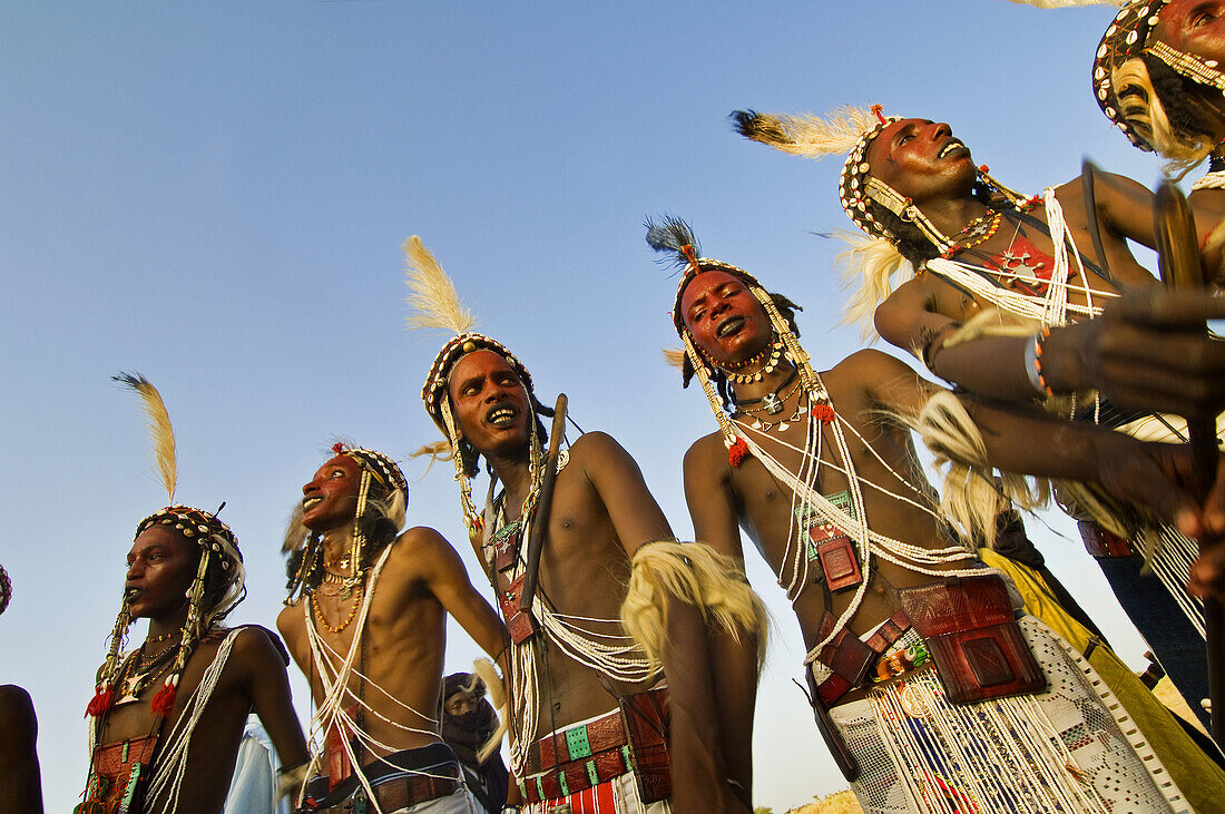 Young Bororo men dancing during Gerewol festival, the most important traditional meeting for Bororo tribe, Niger
