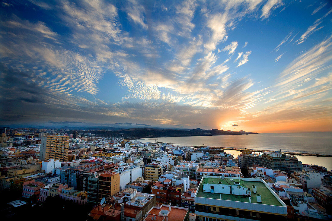 Spain, Gran Canaria, Las Palmas, Sunset taken from a high point within the center of the city, Las Canteras beach