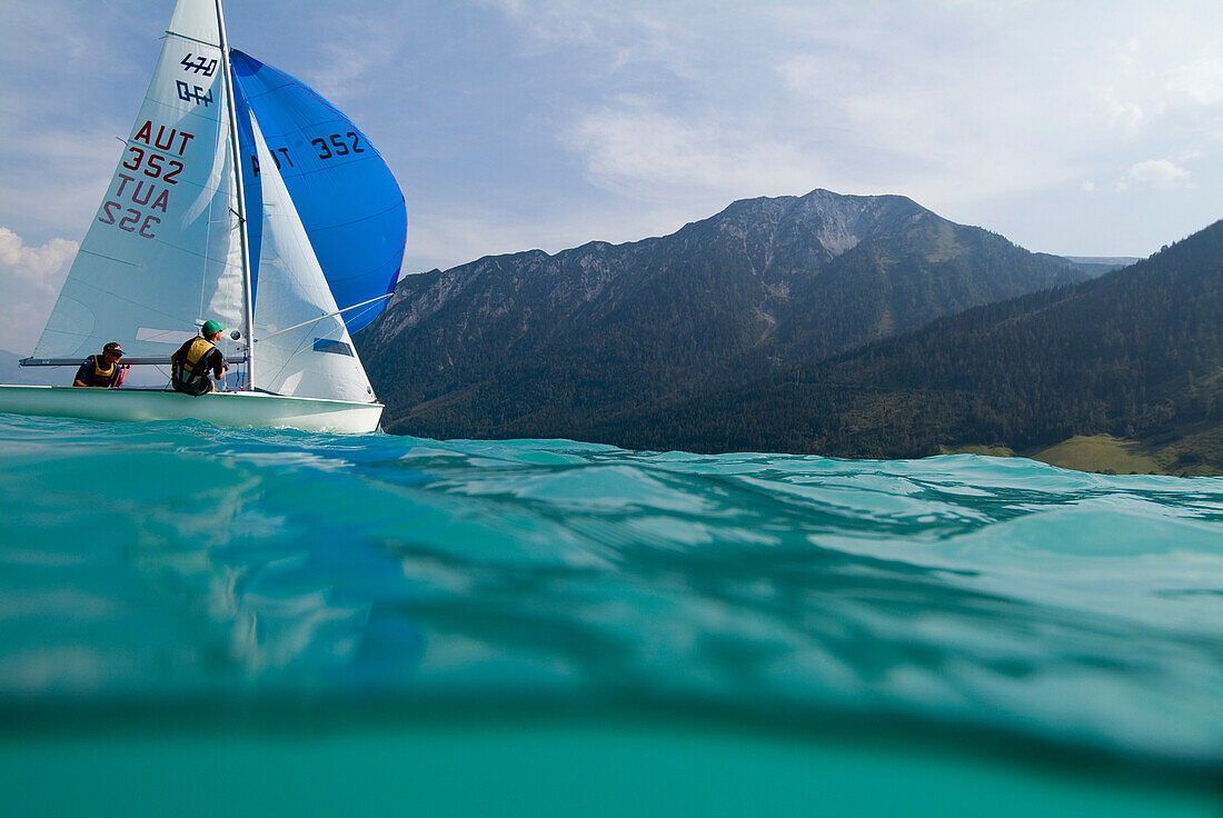 Two men on a sailing boat on lake Achensee, Tyrol, Austria, Europe