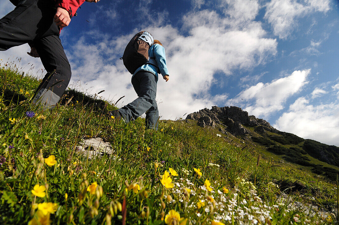Couple hiking in the mountains, Tannheimer Bergen, Allgaeu Alps, Tirol, Austria, Europe
