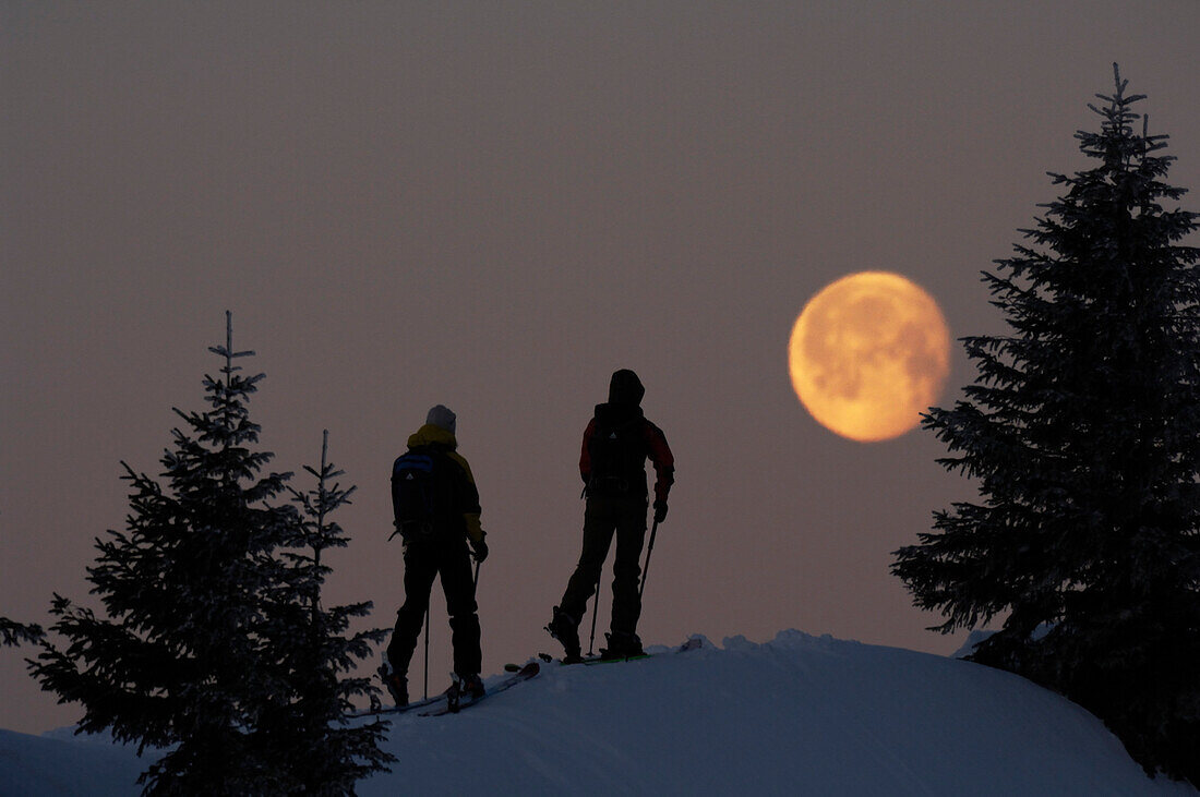 People on a ski tour at Hochgrat at full moon, Allgäu Alps, Bavaria, Germany, Europe