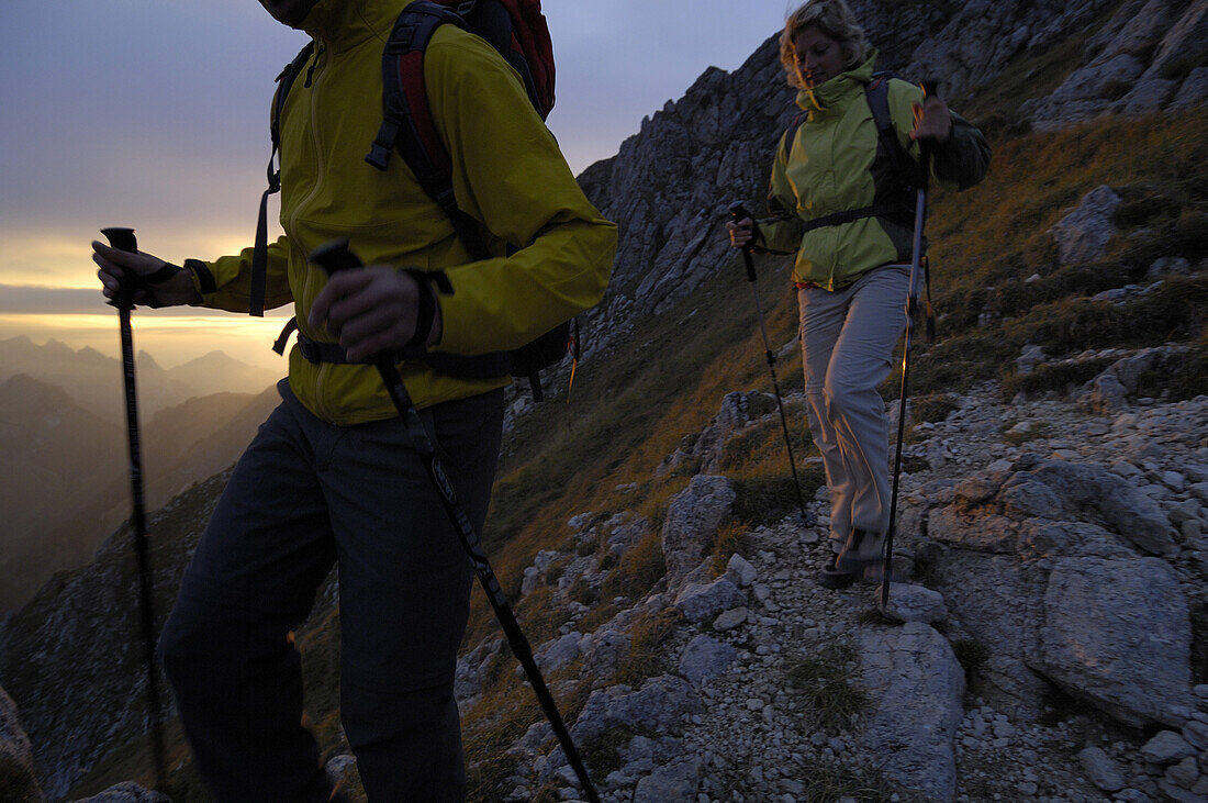 Mountain hikers descenting from mount Klammspitze, Bavaria, Germany