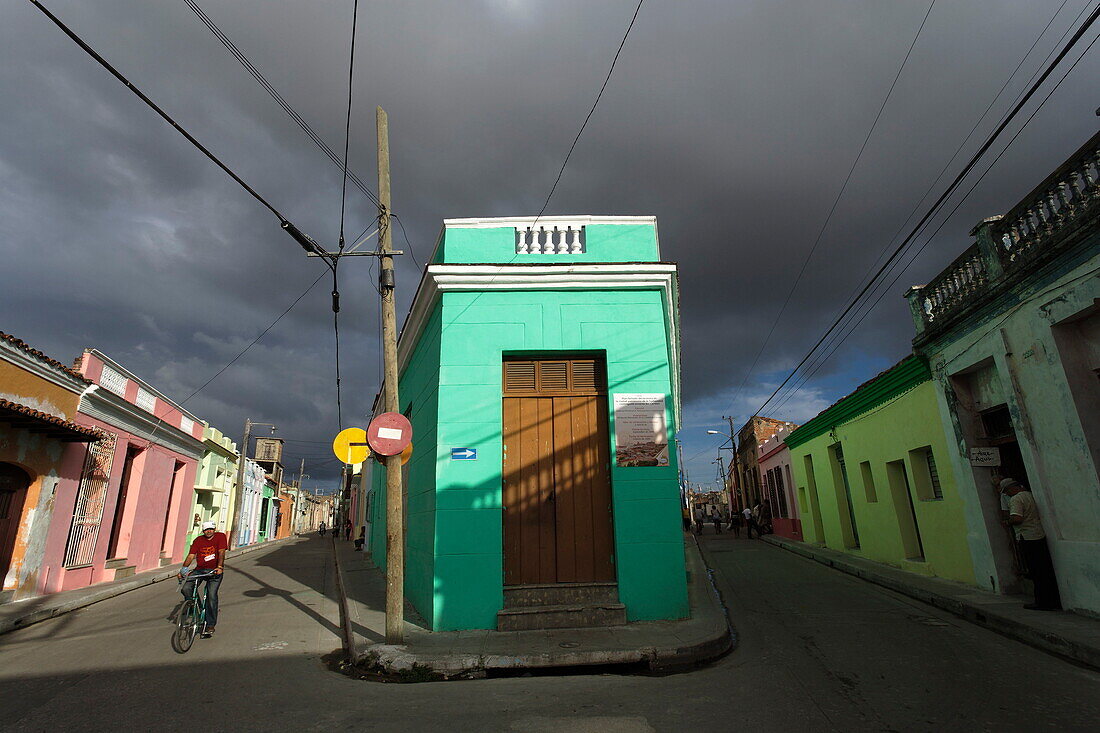 Cyclist in Narrow Street, Camaguey, Camaguey, Cuba, West Indies