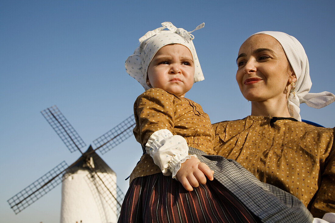 Mother and daughter in traditional costumes, Saffron Rose Festival held each year in the last week of October, Consuegra. Toledo province, Castilla-La Mancha, Spain