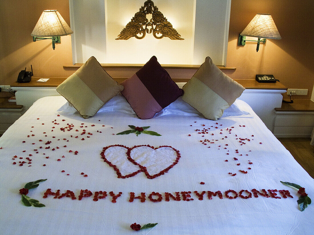 Happy honeymoon sign on bed at the Santiburi Dusit Resort, Ko Samui island, Surat Thani Province, Thailand