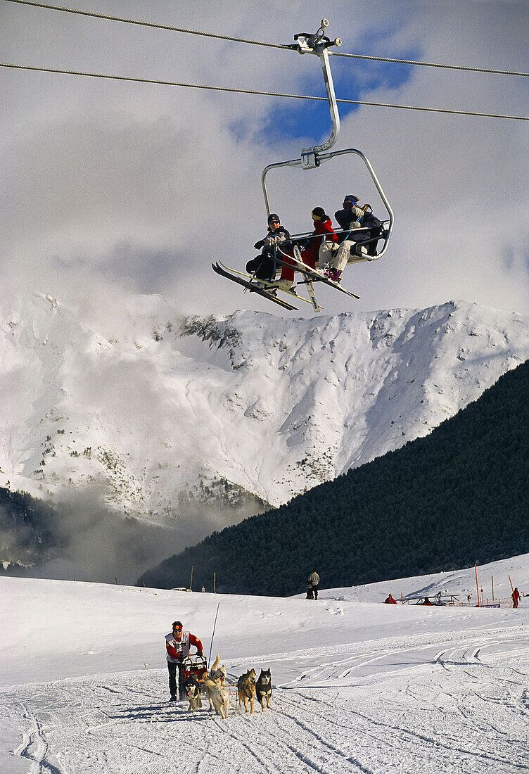 Sled dogs and chairlift. Baqueira ski resort. Valla d´Aran. Pyrenees Mountains. Lleida province. Catalonia. Spain..