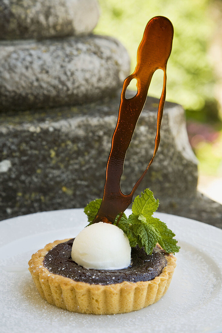 Warm chocolate cake with lemon sorbet and toffee in the restaurant of Pena National Palace, Sintra, Portugal