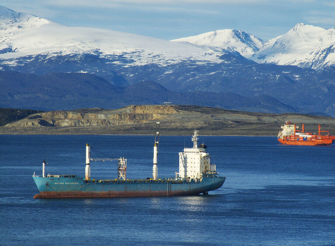 America, Argentina, Calm, Cargo, Container, Del, Earth, End, Fire, Landscape, Maritime, Month, Months, Mountains, Of, Panoramic, Patagonia, Peak, Port, Snow, Snowy, South, The, Top, Trade, Ushuaia, Vessel, View, Waters, World, XC8-764950, agefotostock