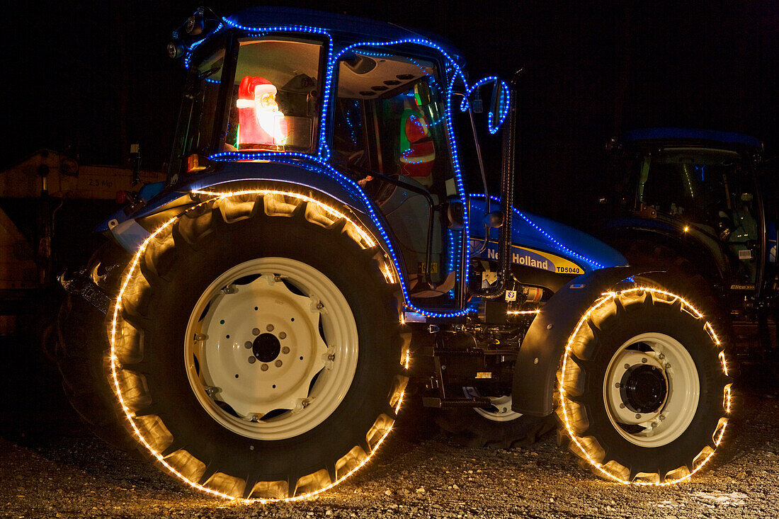 Tractor with Christmas illumination, Ore mountains, Saxony, Germany