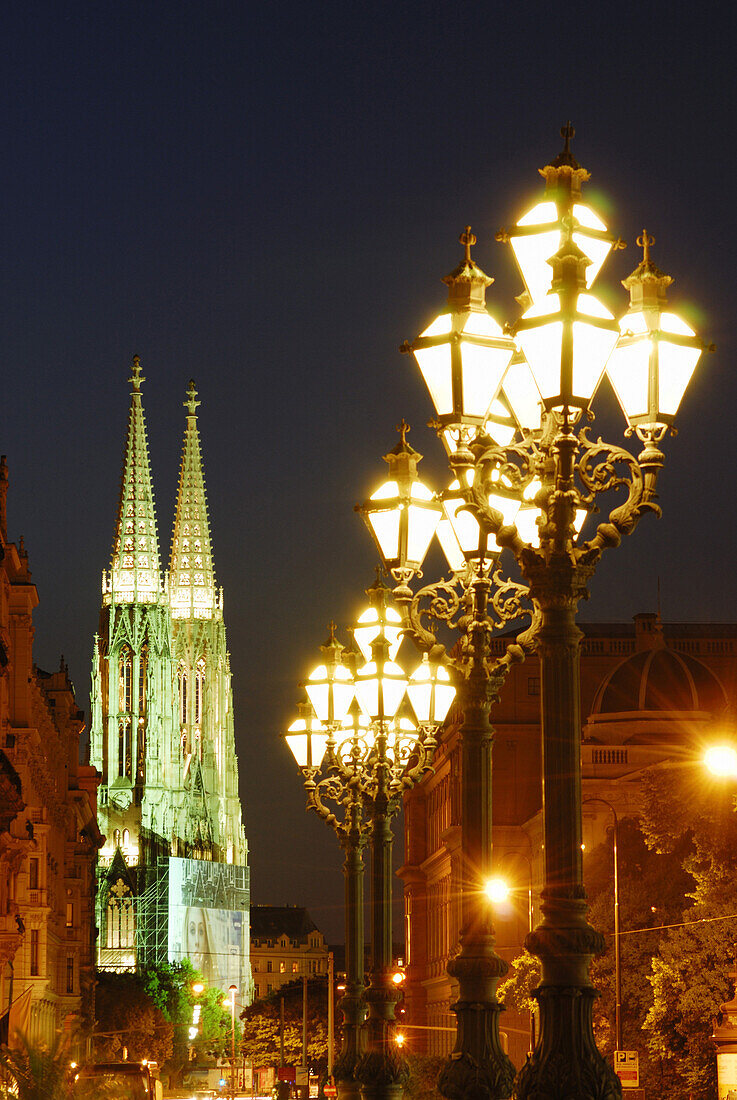 Illuminated Votive Church at night, Vienna, Austria