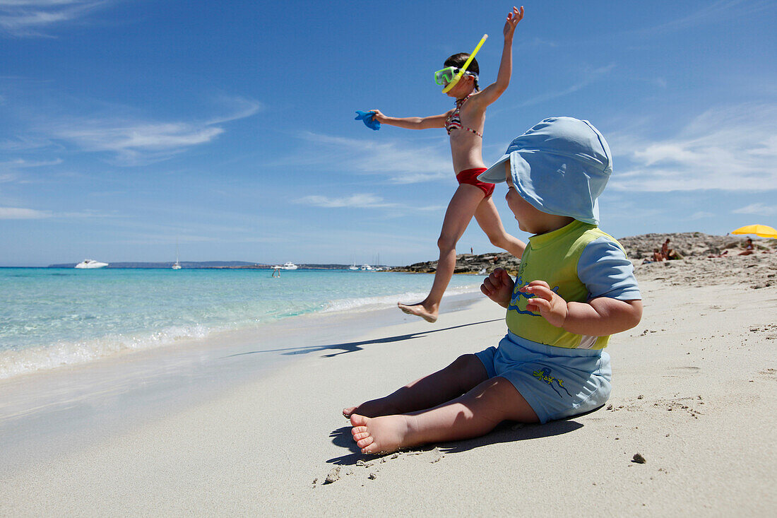 Children playing on the beach, Playa de Llevant, Formentera, Balearic Islands, Spain