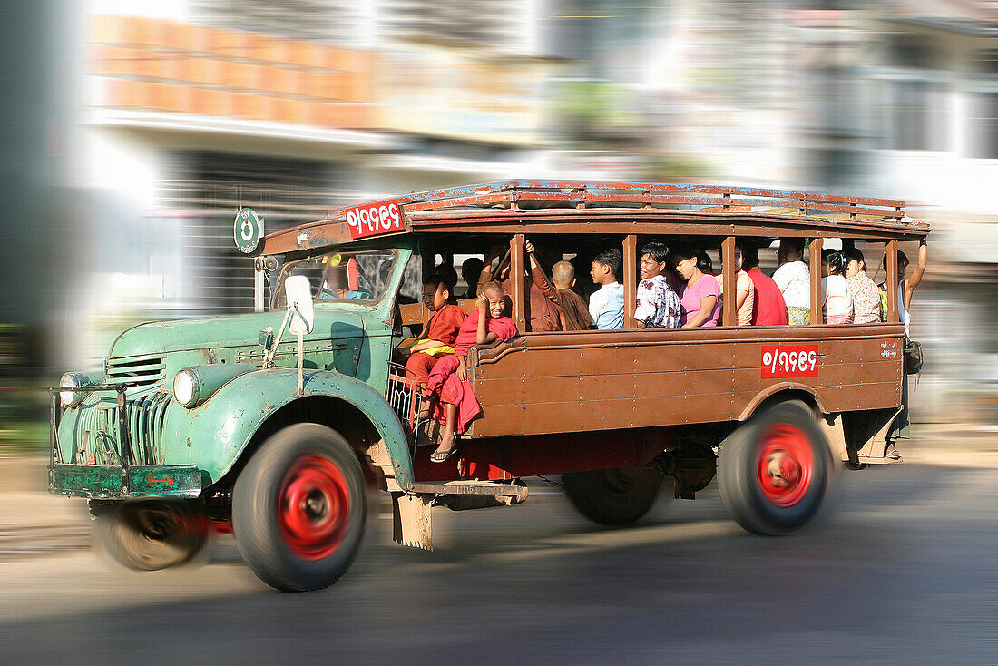 Old local bus packed with passengers, Moulmein, Burma