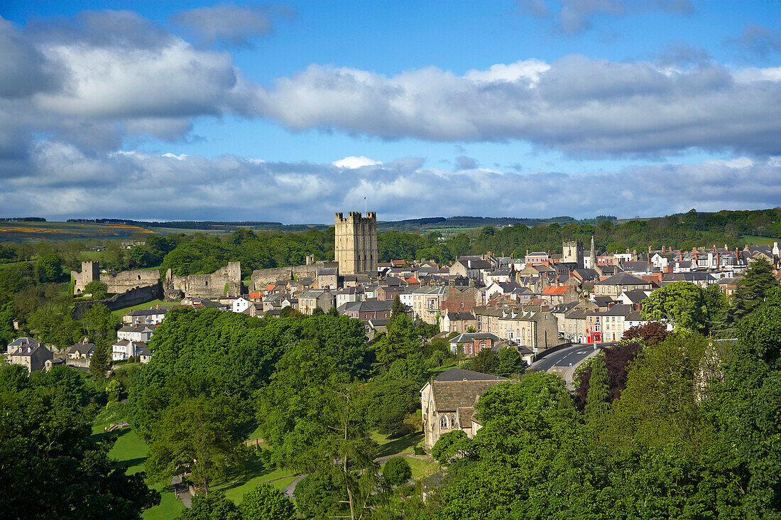 View over the town and castle surrounded by trees, Richmond, Yorkshire, UK, England