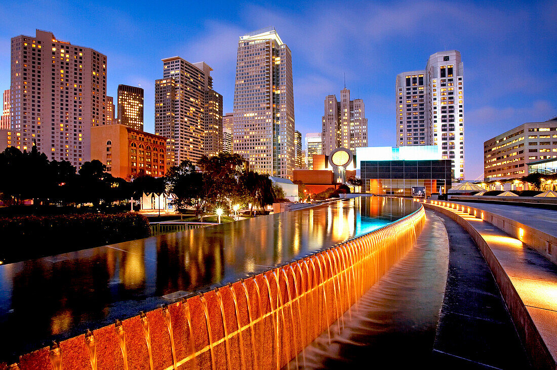 Esplanade Gardens and Museum of Modern Art at Yerba Buena Gardens at dusk, San Francisco, California, USA