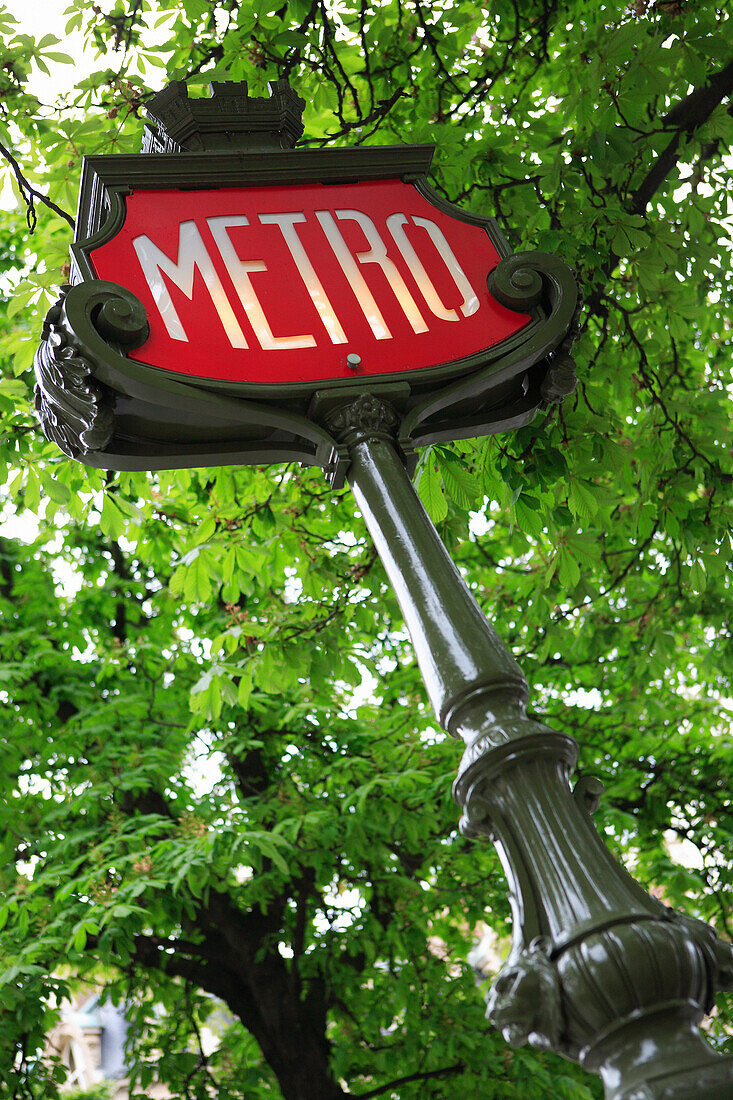 Metro sign along the Champs Elysees, Paris, France