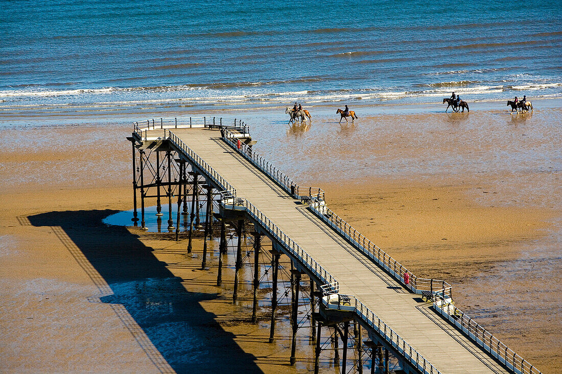 Horse riders on the beach, Saltburn, Cleveland, UK, England
