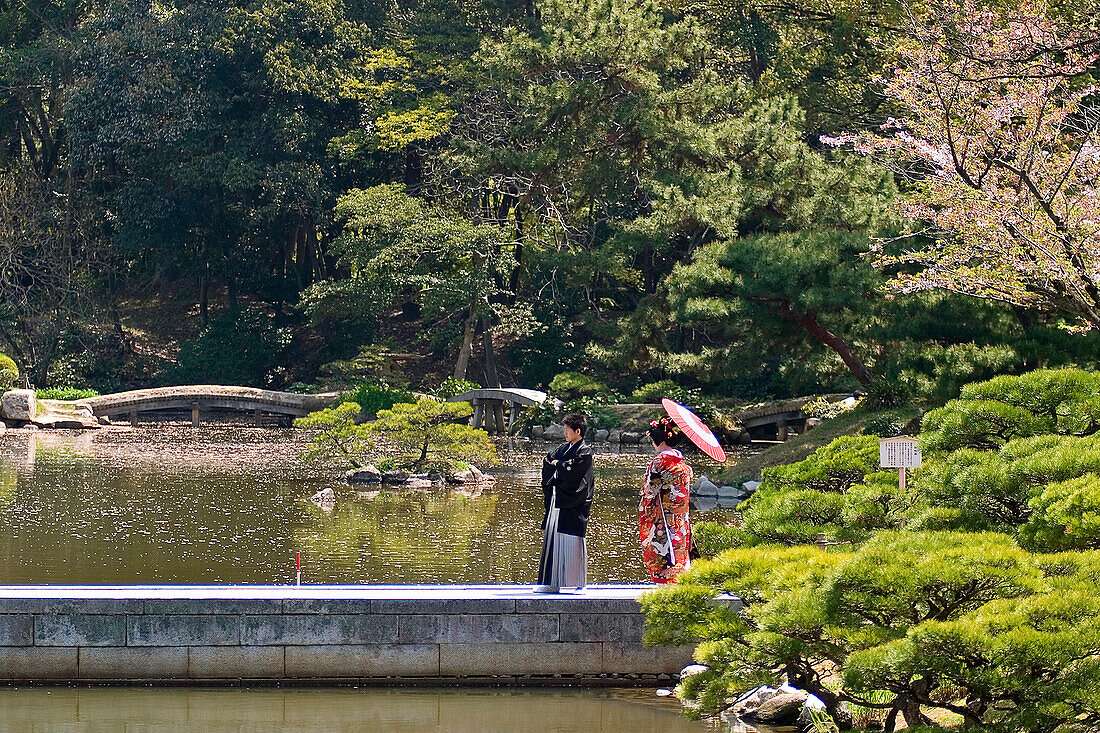 Wedding couple in Shukkeien garden, Hiroshima, Japan