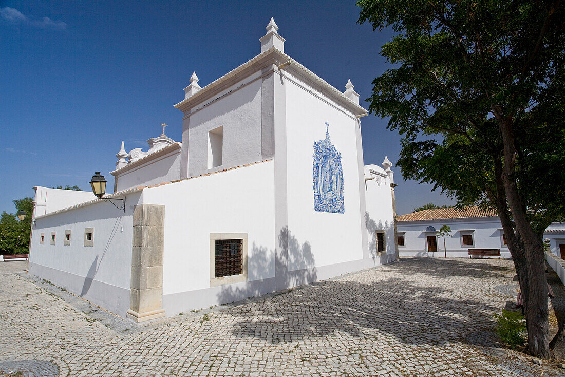 Exterior view of the church Igreja Sao Lourenco, white walls, chapel, Almancil, Algarve, Portugal
