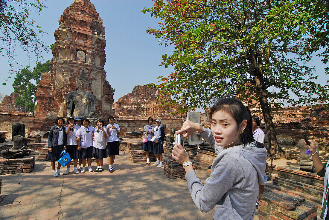 Thai school girls visiting Historical Park, Ayutthaya, Wat Mahatat, Thailand, Asia