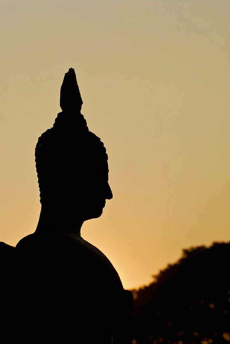 Silhouette of Buddha head, Wat Mahathat, Sukothai Historical Park, Central Thailand, Asia