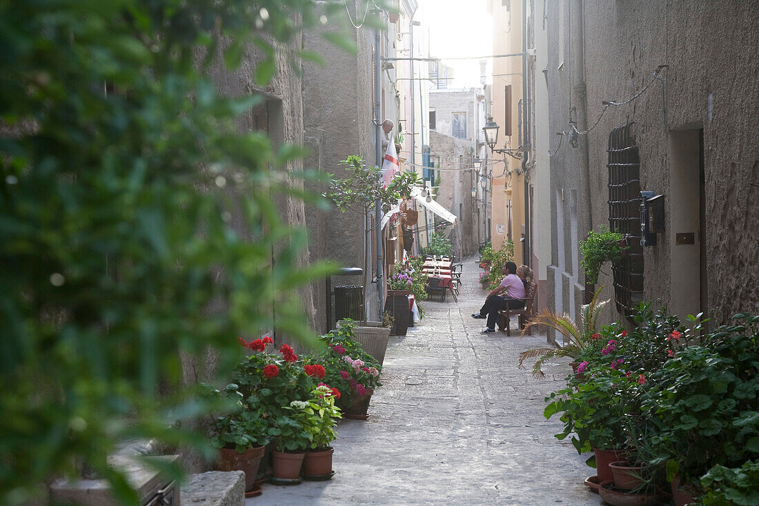 View into narrow alley at the Old Town, Castelsardo, Sardinia, Italy, Europe