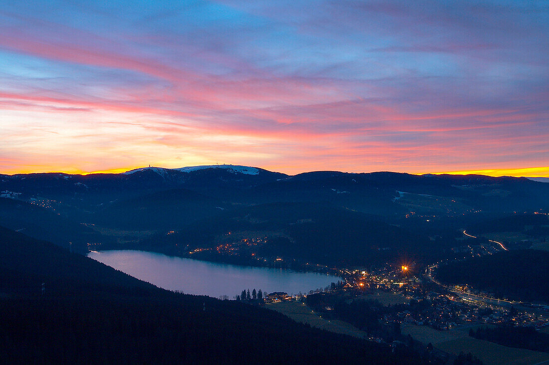 Winter, View from the Hochfirst to the Titisee (lake) and the mountain Feldberg at sunset, Black Forest, Baden-Württemberg, Germany, Europe