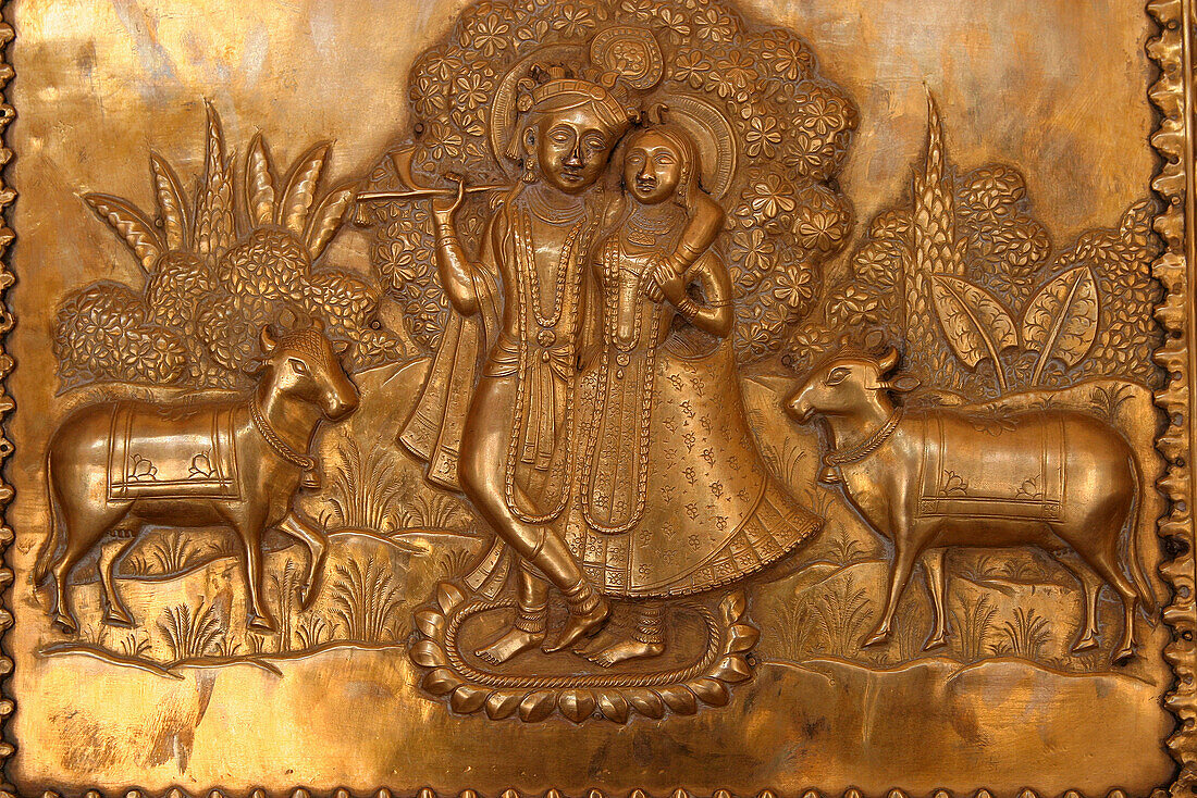 Detail of door panel at the City Palace, Jaipur, Rajasthan, India