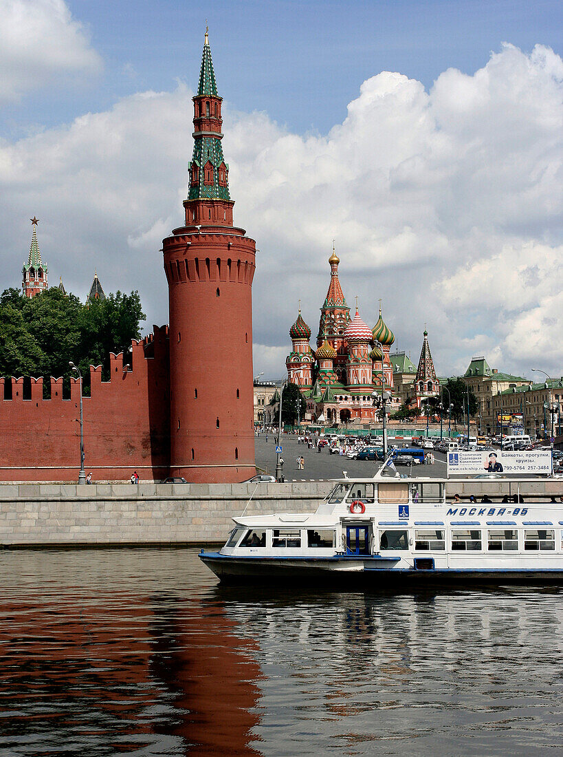 Kremlin tower and St Basil's Cathedral from river, Moscow, Russian Federation