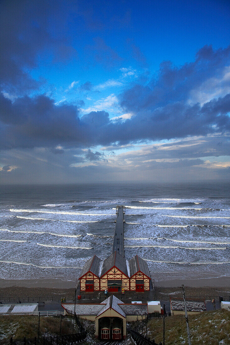 Cliff lift and pier in winter, Saltburn, Cleveland, UK, England