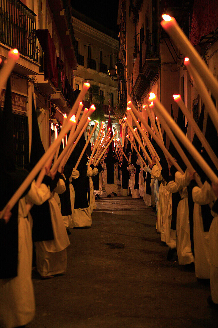 Easter Parade, procession of candleholders at night, Seville, Andalucia, Spain