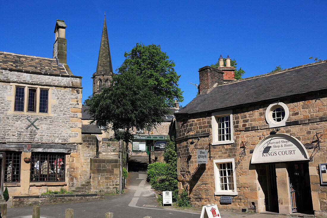 View of shops and Parish Church, Bakewell, Derbyshire, UK, England