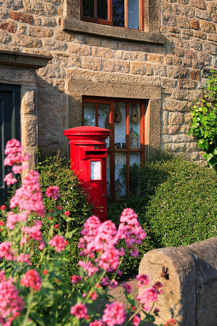 Village post box outside cottage, Calver, Derbyshire, UK, England