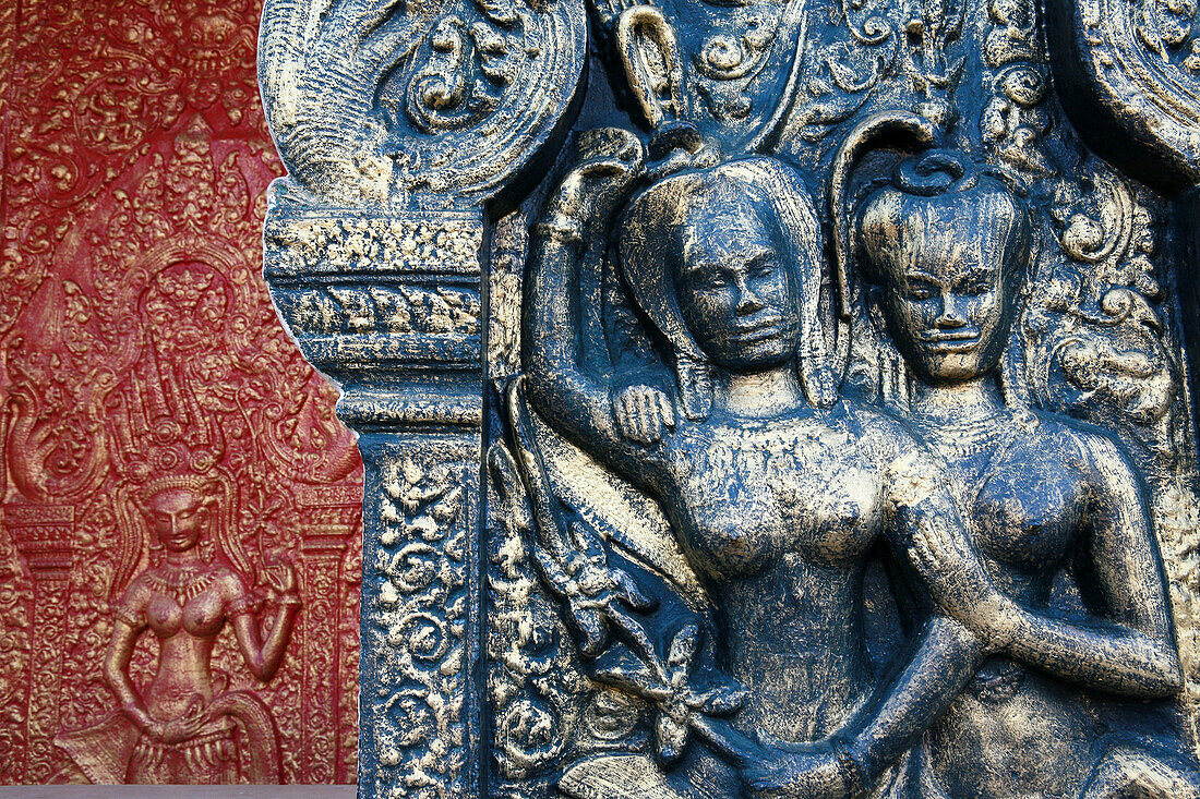 Carved and painted panels at Wat Phnom, Phnom Penh, Cambodia