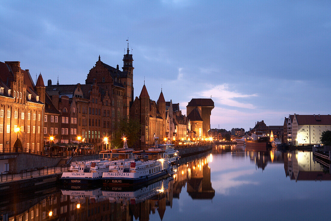 View along quayside at dusk, Motlawa River Inner Port, Gdansk, Poland