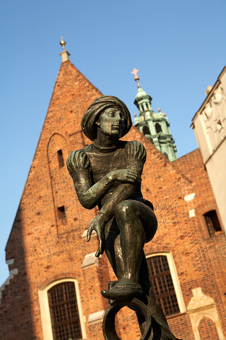 Scholar Fountain in Mariacki Square, Krakow, Poland