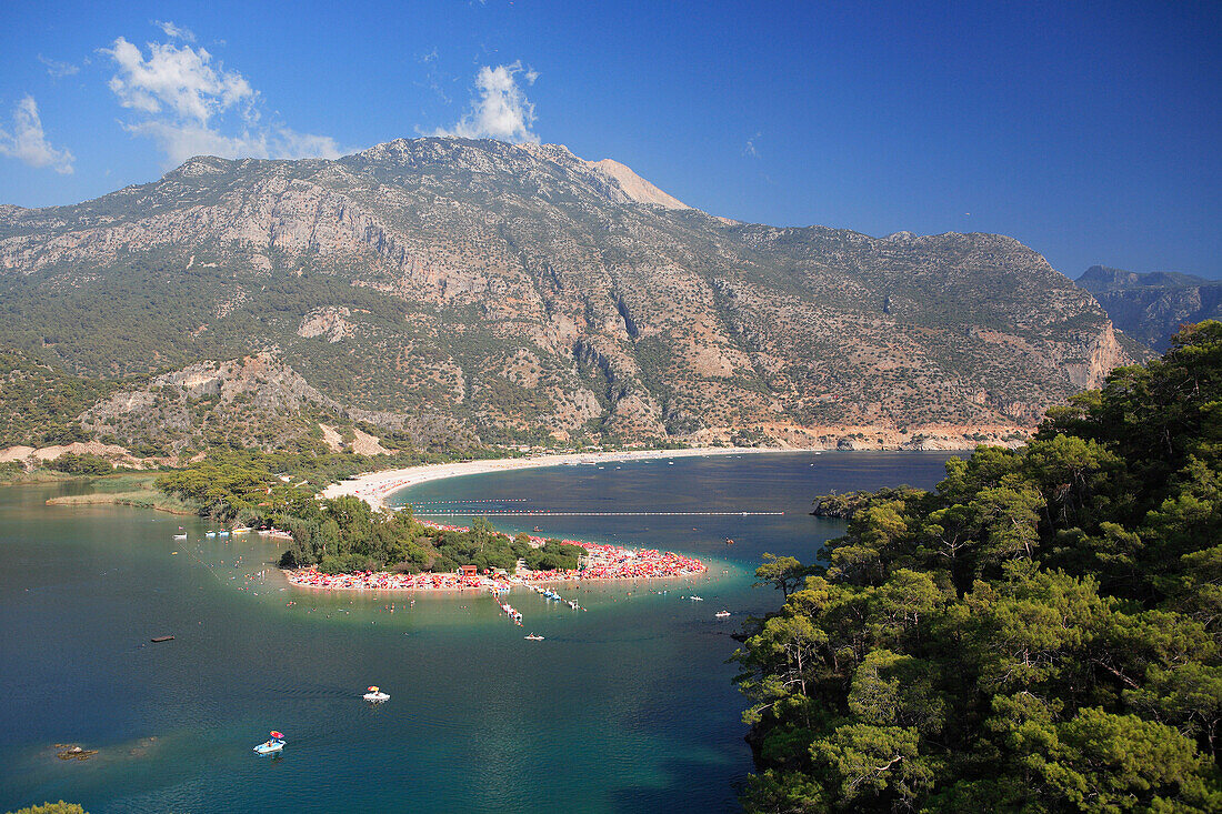 View over Blue Lagoon and beach to mountains, Oludeniz, Mediterranean, Turkey