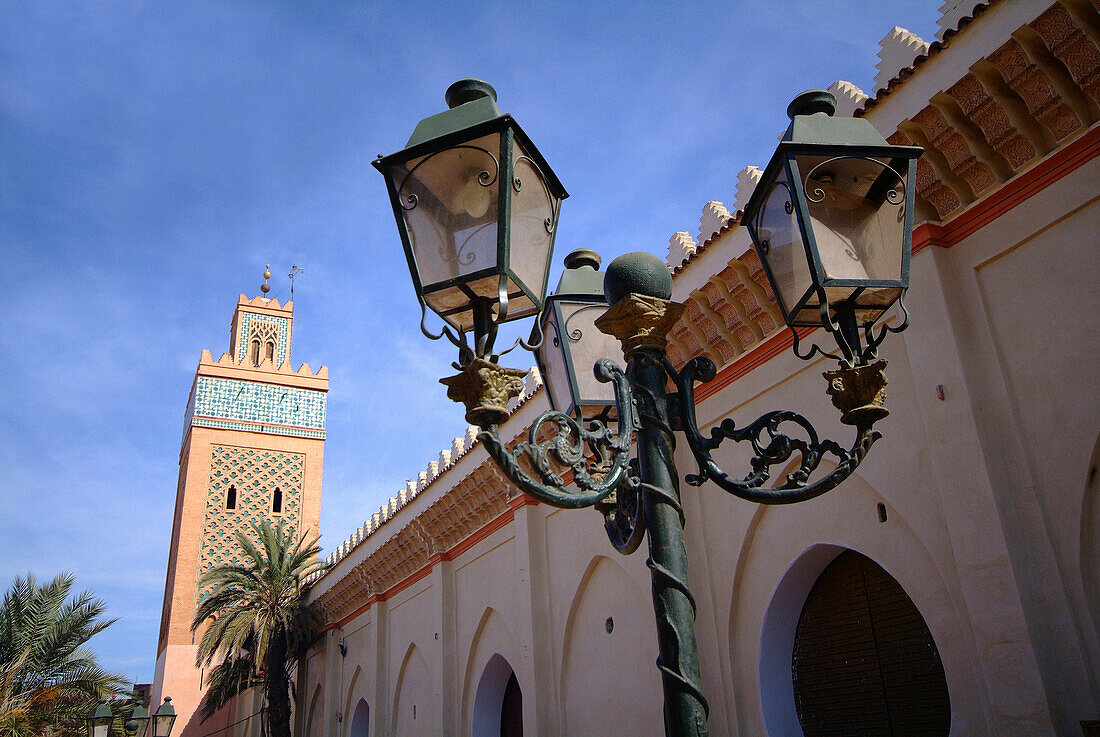 Minaret and lamp post at Palais el-Bedi, Marrakesh, Morocco