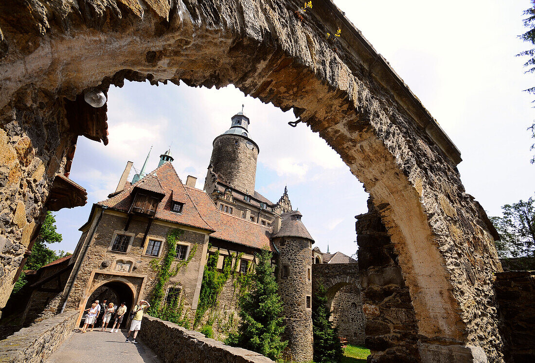 View through a gate at Tschochau castle, Bohemian mountains, lower-Silesia, Poland, Europe