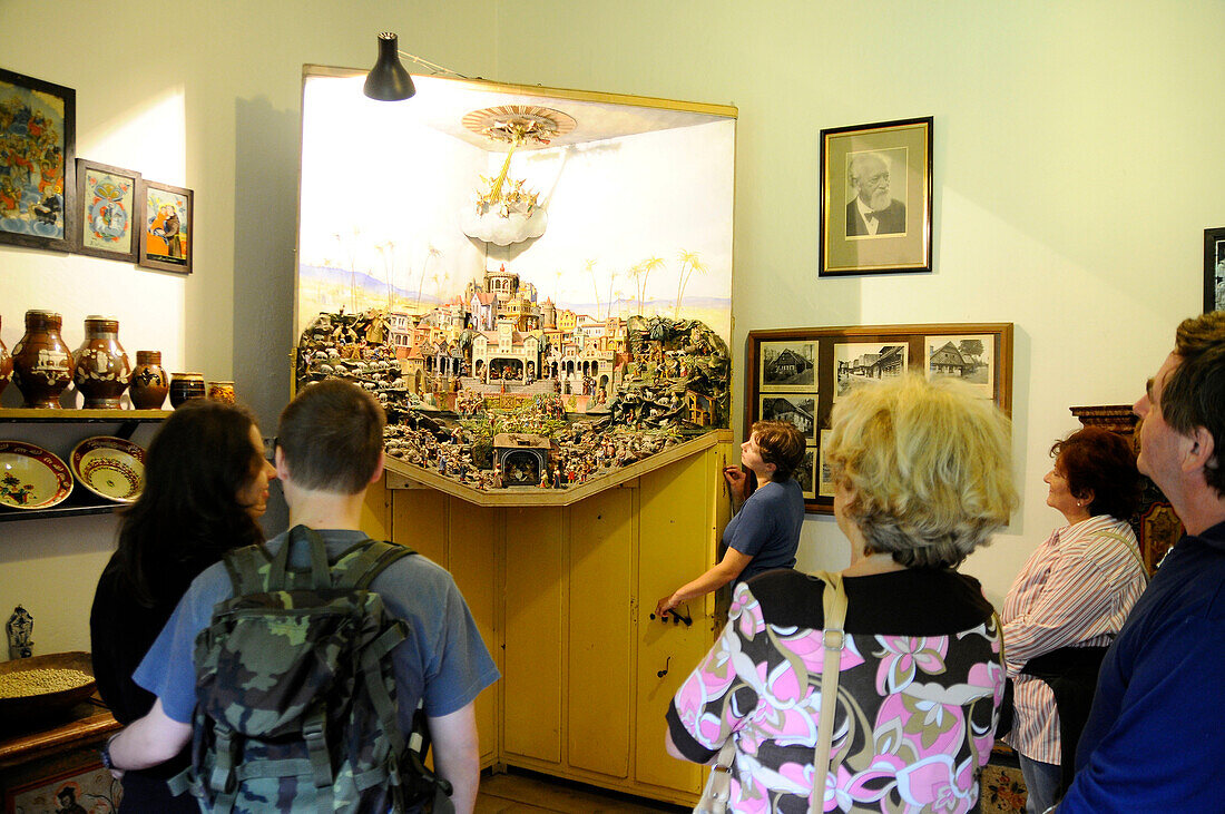People looking at a picture at the Bohemian mountains museum, Jilemnice, Bohemian mountains, east-bohemian, Czech Republic, Europe