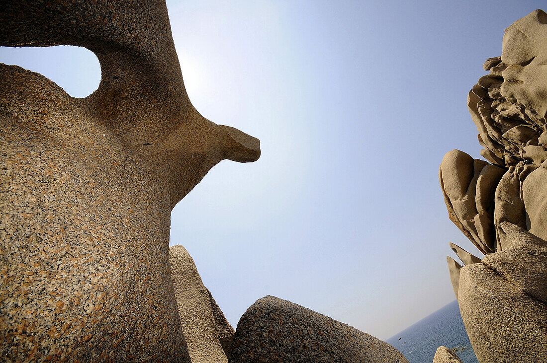 Rock formation on the waterfront in the sunlight, North Sardinia, Italy, Europe