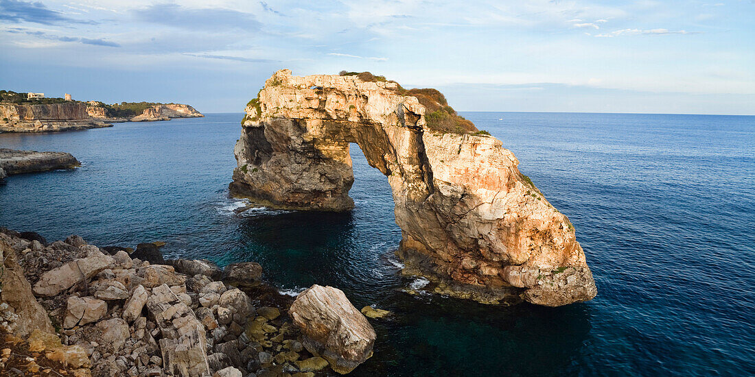 Archway of Es Pontas under clouded sky, Cala Santanyi, Mediterranean Sea, Mallorca, Balearic Islands, Spain, Europe