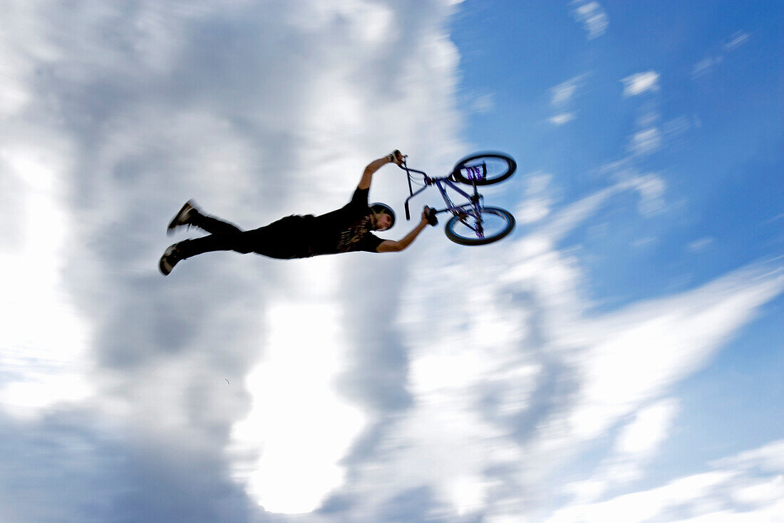 BMX cyclist in mid-air, Munich, Bavaria, Germany