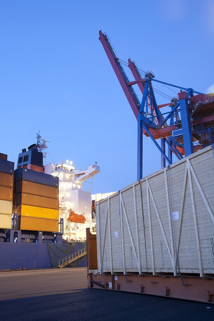 Container ship at container gantry crane, Port of Hamburg, Germany